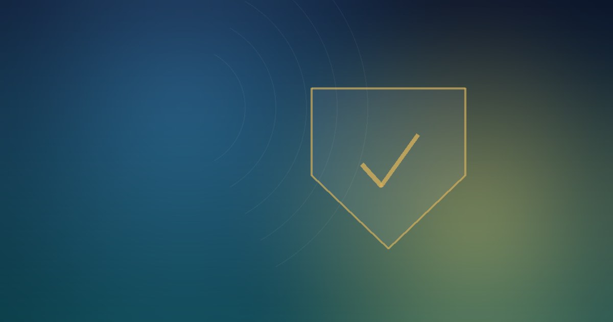 Gold shield with a tick on a navy and teal background, symbolising licensed and safer online casino play