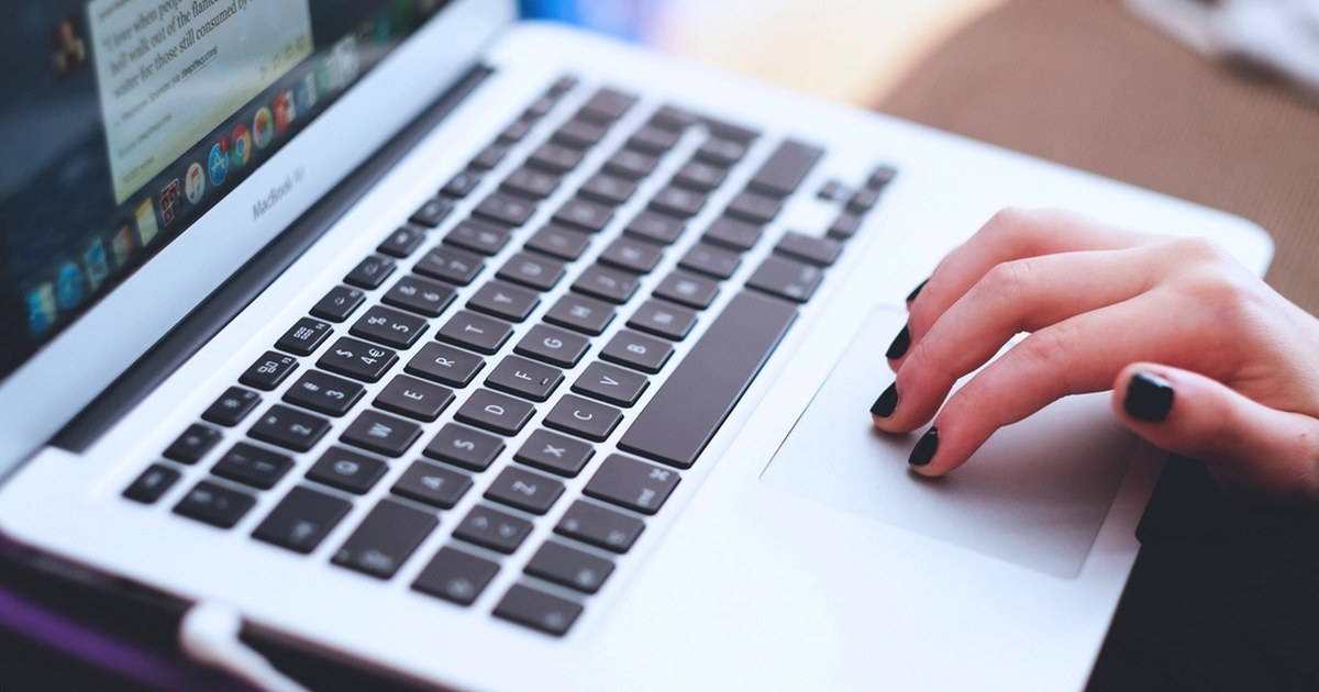 Person using a laptop to manage an online account
